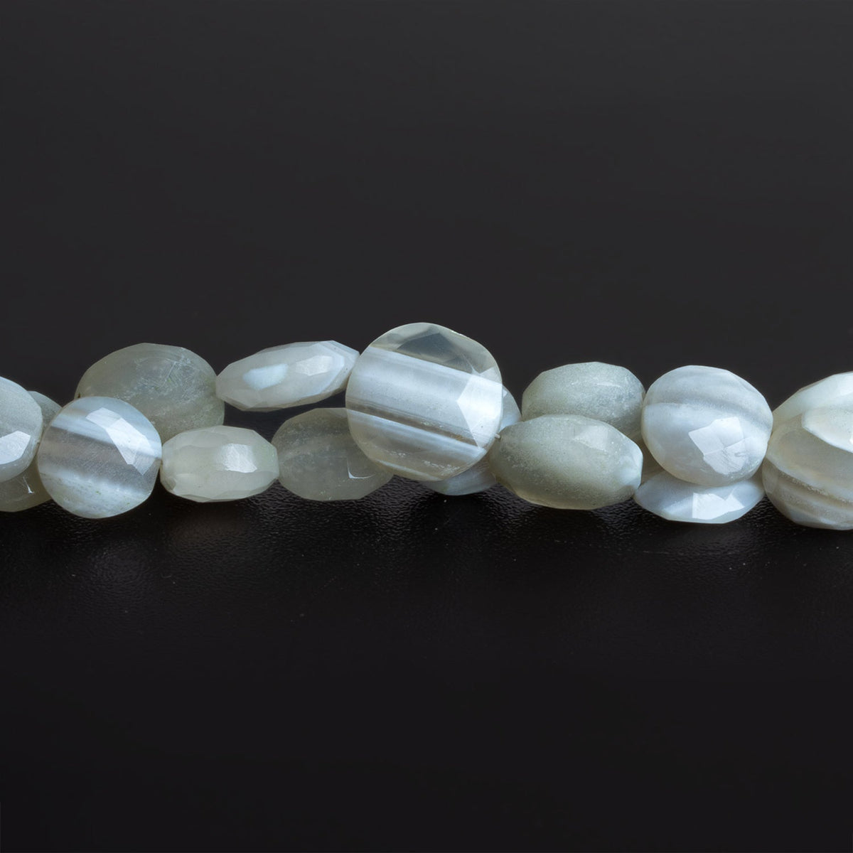 10-13mm Denim Opal Faceted Coins 8 inch 17 beads