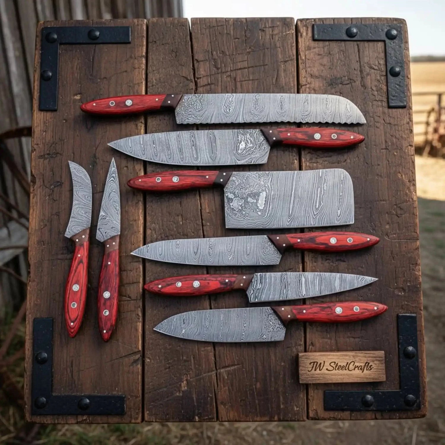 8 Piece Damascus Knife Set with Red Pakka Handles and Leather Roll