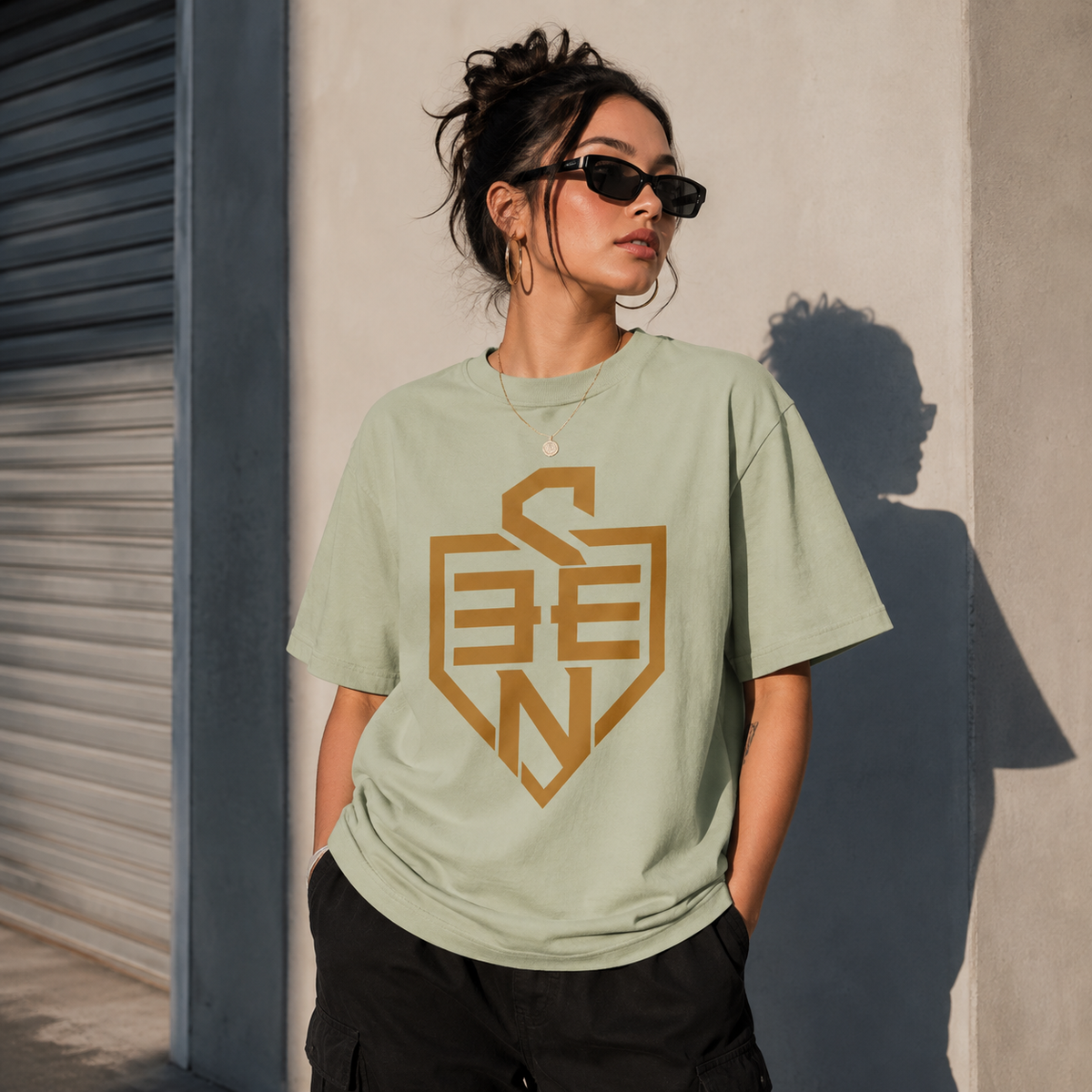 SEEN Shield Logo Tee — Gold Emblem Graphic T-Shirt