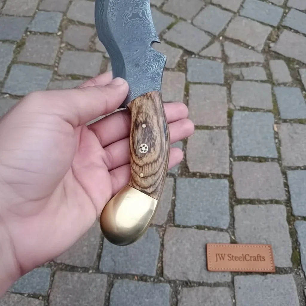 Damascus karambit knife..